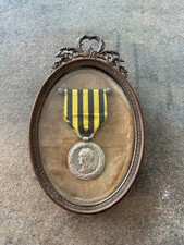 Médaille du Dahomey 1892 fabrication LEMAITRE. dans un joli cadre en bronze