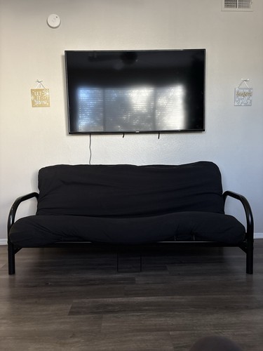 Selling black futon - , $110