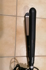 Fer à lisser en parfait état