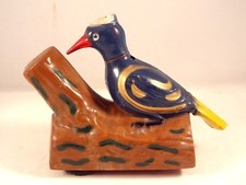 Ancien jouet rare oiseau sur