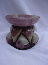 DELATTE Nancy. VASE en verre marmoréen soufflé dans une monture en fer forgé.