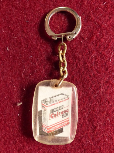 Porte clé plastique huile - porte,