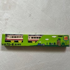 Train à flèches rouges TOMY avec voiture électrique et interrupteur avant