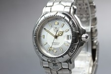 Presque comme neuf - **, montre