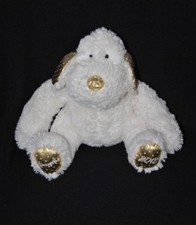 Peluche doudou chien DOUGLAS 2012 blanc doré étoiles 24 cm assis TTBE