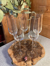Grandes flutes à champagne en cristal  x 5  " Médard de Noblat ", neuves.