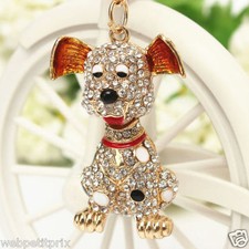 PORTE CLÉS Chien Tète Qui