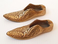 Pair gold brass shoe - of,