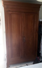 armoire ancienne bois style Louis Philippe en noyer.