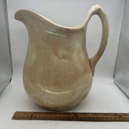 Antique water pitcher stamped - pitcher,