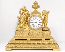 Pendule bois doré déesse