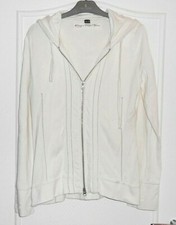 Joli gilet à capuche tricot