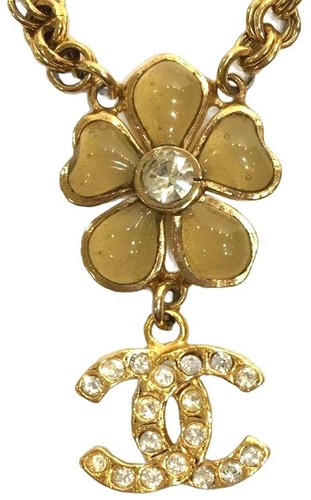 Collier pendentif fleur logo