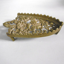 ancien repose fer a repasser en bronze ornemental
