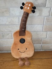  Peluche En Fotme De Guitare  ? Marron Pas De Marque Connue 33cm Env Ttbe