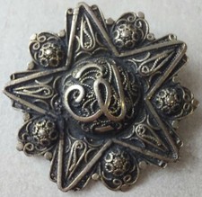 Ancienne broche, écriture