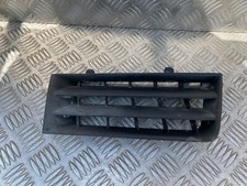 Cache grille pare choc avant