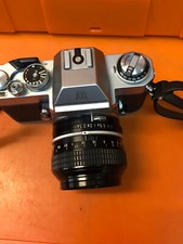 Appareil photo Nikon Nikkormat + Objectif Nikon Nikkor 1:1.4 50mm