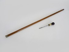 Canne de marche à système tire bouchon en bois début XXème