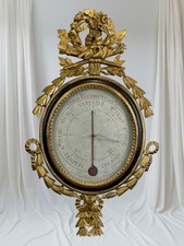 BAROMÈTRE DU XVIIIE ÉPOQUE LOUIS XVI EN BOIS SCULPTÉ DORÉ ( MAISON CHEVALLIER  )