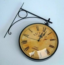Horloge murale double face de
