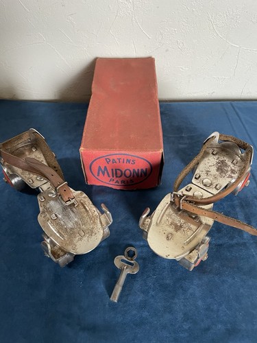 Paire patins roulettes - patins,