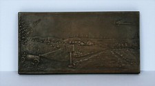 Plaque publicitaire bronze
