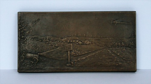Plaque publicitaire bronze