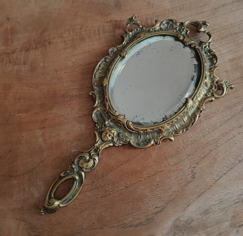 Miroir face main bronze - main,