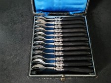 12 fourchettes à huitres en argent massif manche en ebene poinçons Minerve