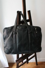 Lancel sac de voyage modèle Grand Hôtel en cuir noir