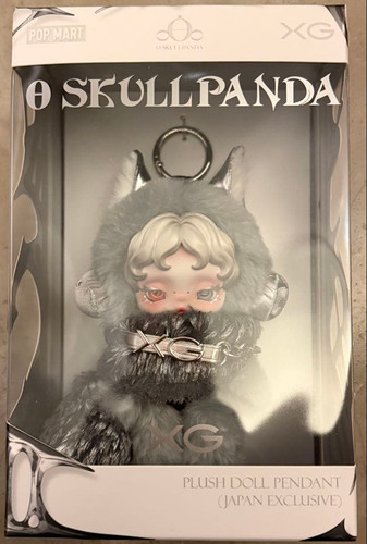 Pendentif poupée peluche