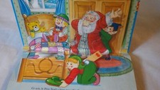 Livre Pop Up les jouets du père Noël 2002 rare