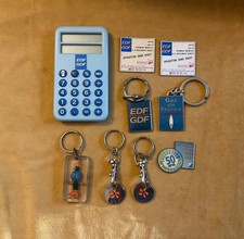 EDF GDF calculatrice Zeltron porte cle magnet jeton caddie