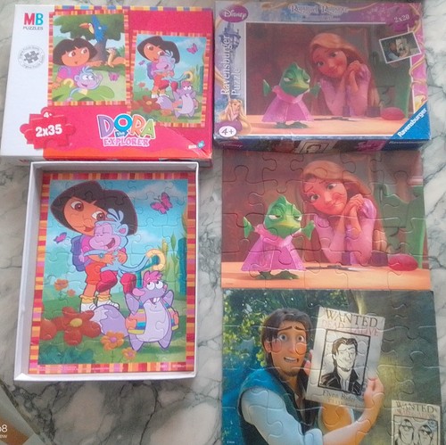 Lot puzzles enfant dora - de,