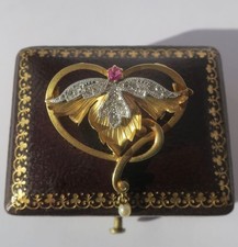 Pendentif broche ancien volute