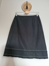 PAULE KA : JUPE NOIRE MICRO VOLANTS ET SURPIQURES 