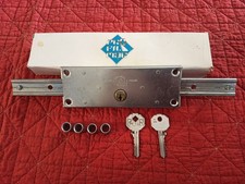 SERRURE A TRINGLE PORTE DE GARAGE ET RIDEAU METALLIQUE PREFER