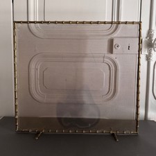 Pare-feu en bronze doré