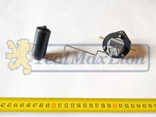 Puits de jauge de réservoir