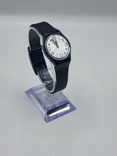 XM montre Swatch quartz noire