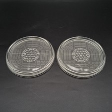 Paire de dessous de bouteille