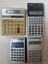 Lot 4 Calculatrices Casio Canon Texas Vintage 