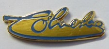 Pin's Coluche , " signature