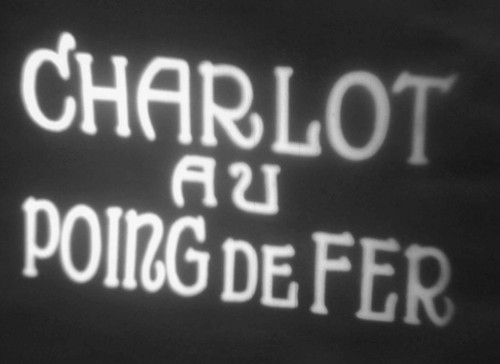 Charlot poing fer - au, (1915)