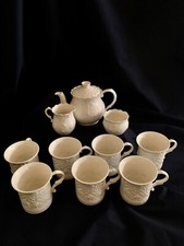 Théière, 7 mugs, sucrier