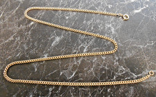 Chaine maille gourmette massive  en or  18 K  poincon  tete d aigle