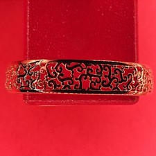 Bracelet jonc ajouré motif oriental ouvert plaqué or jaune 18k avec poinçon.