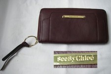 comme neuf COMPAGNON  EN cuir grenat lie de vin 20X10.5X2cm see by chloé