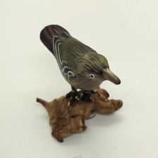 sculpture oiseau en bois sur